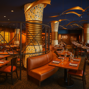 Vista da parte de trás da sala de jantar, mostrando esculturas de aves amarelas penduradas