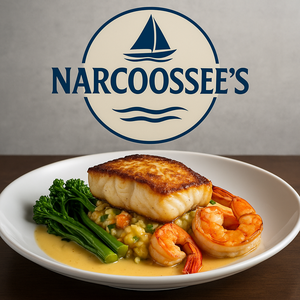 Uma porção de peixe servida com milho e outros legumes